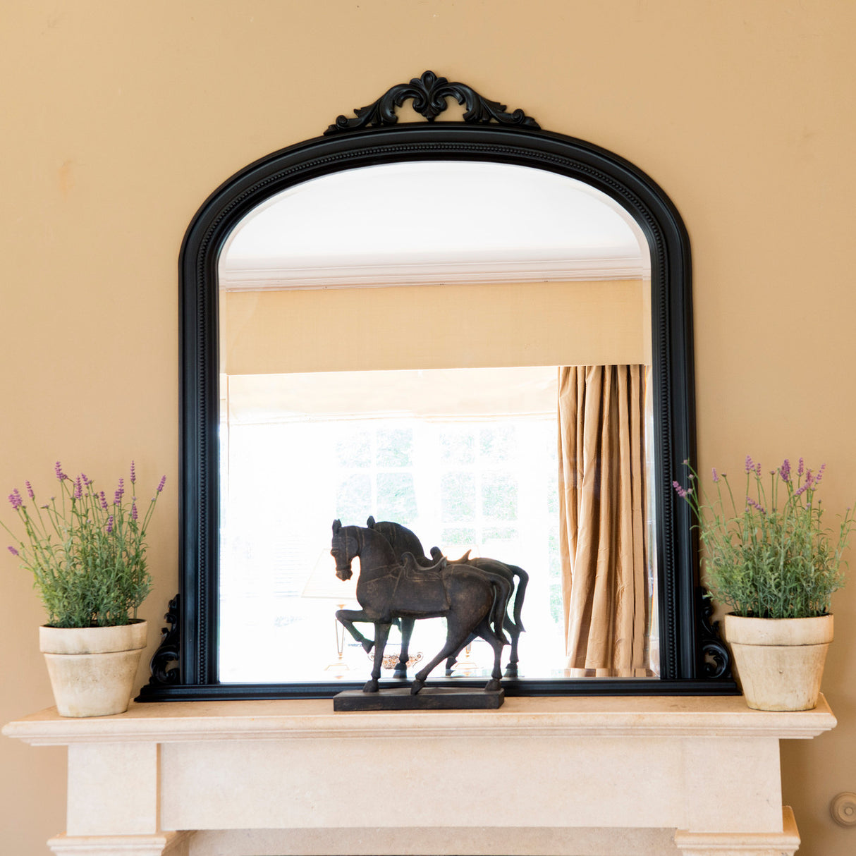Black decorative frame arched beveled edge glass mirror