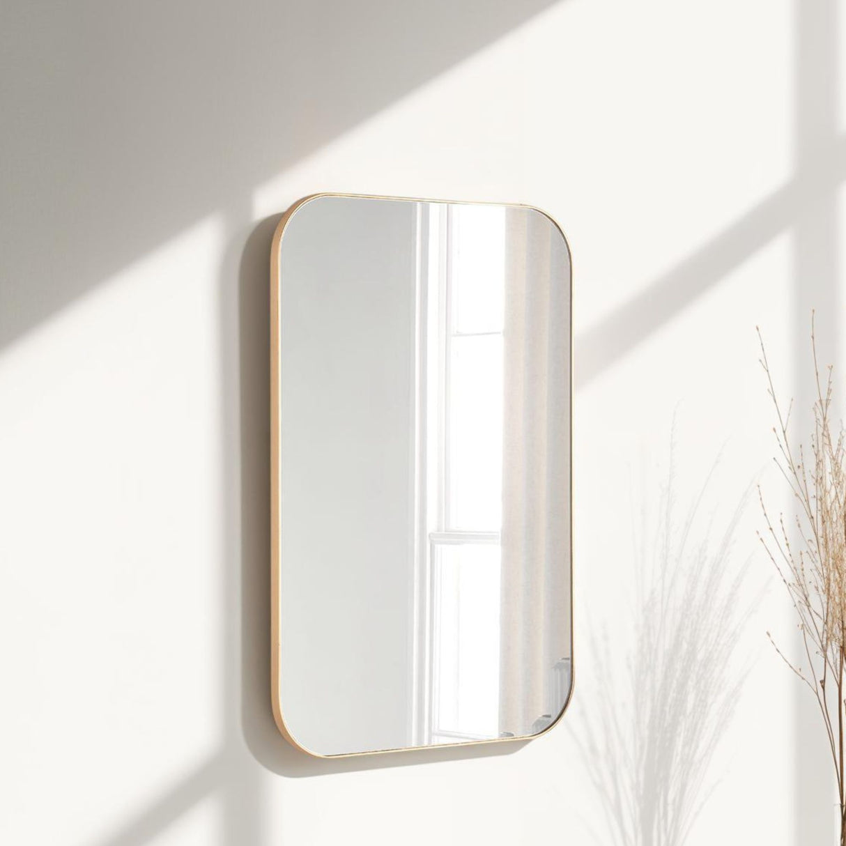 Arendal curved Minimal gold mirror