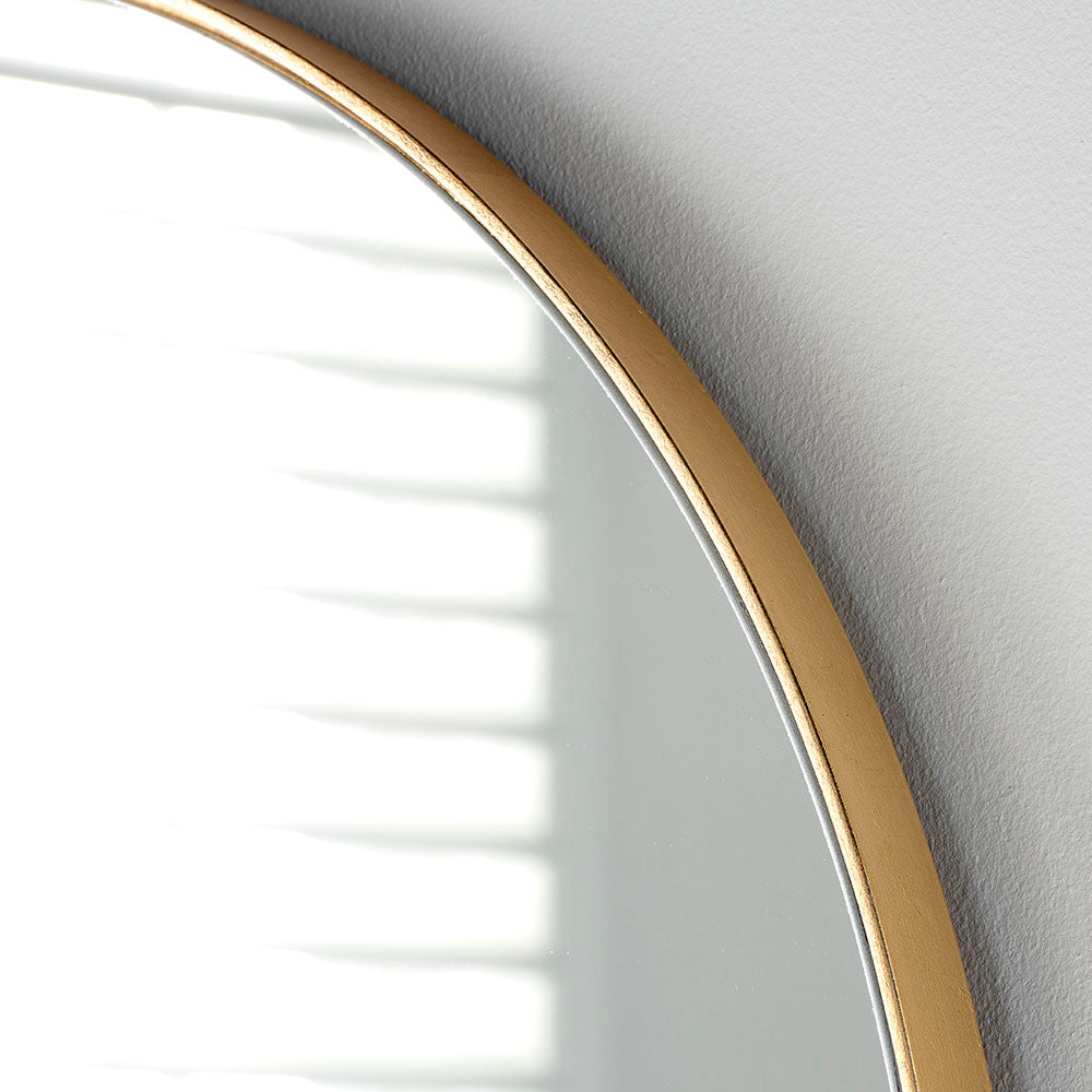 Tall slim framed oval mirror in gold