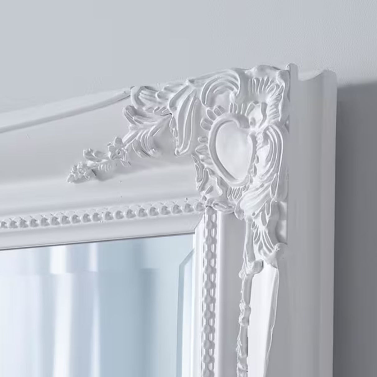 Carved french style white framed mirror