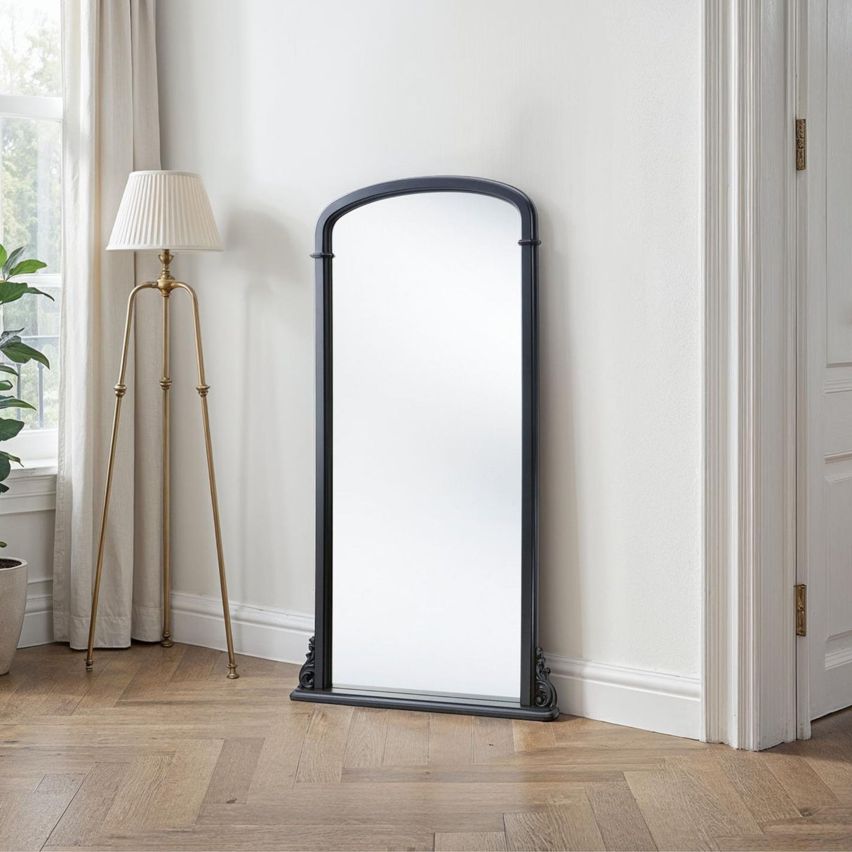 Tall curved black mirror