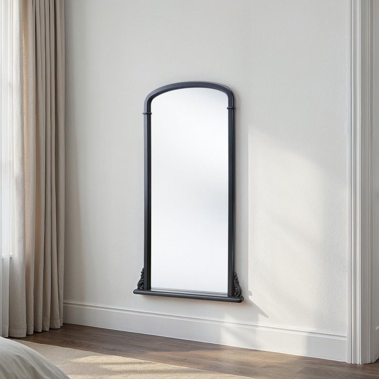 Tall curved black mirror