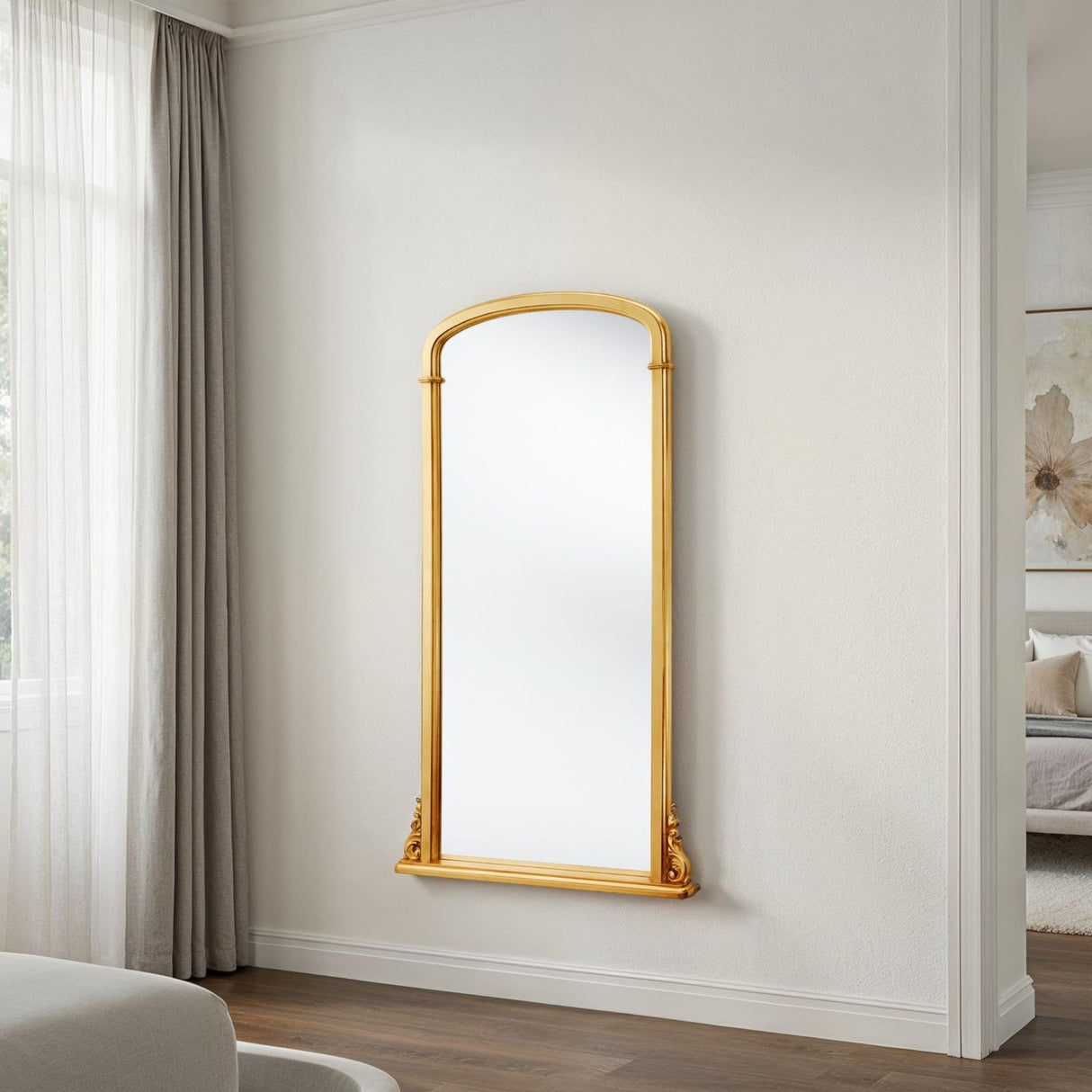 Tall arched gold mirror