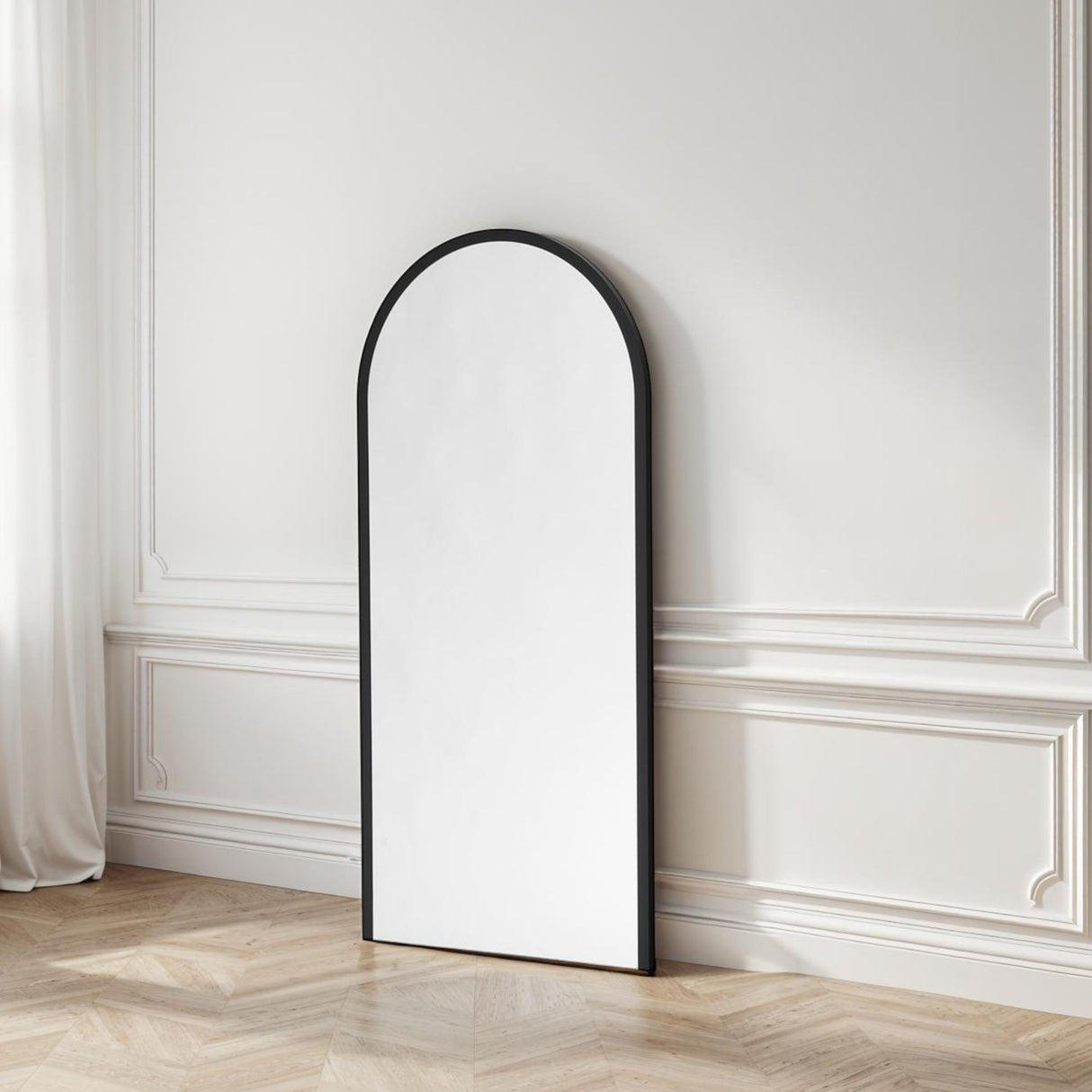 Large black arch mirror