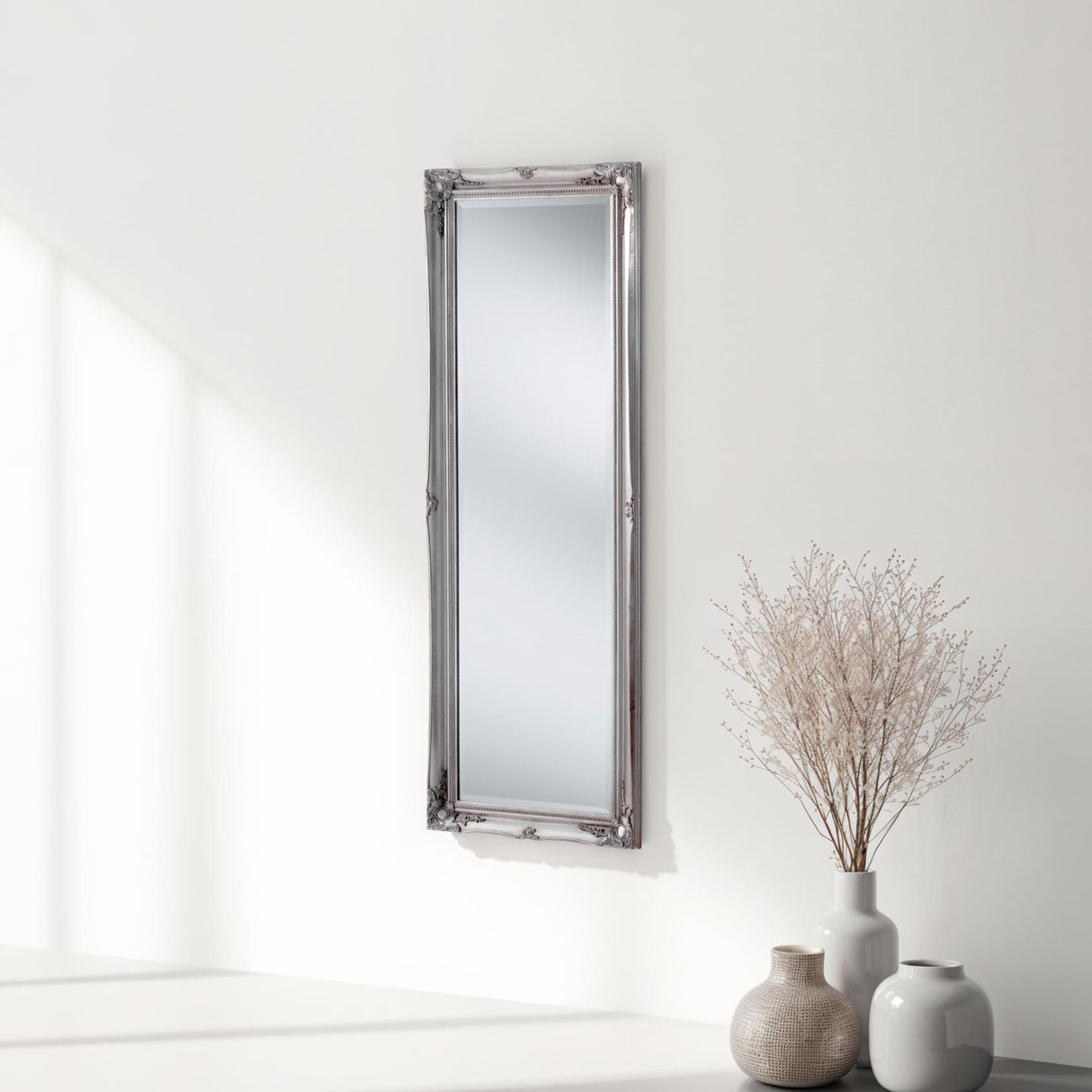 Carved full length French style mirror in silver