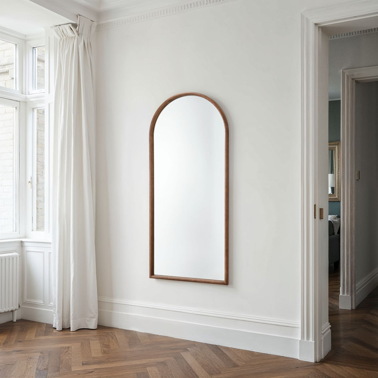Arched Walnut floor mirror
