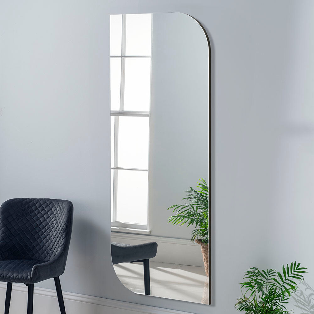 Black irregular rectangular curved edge minimal frame glass mirror