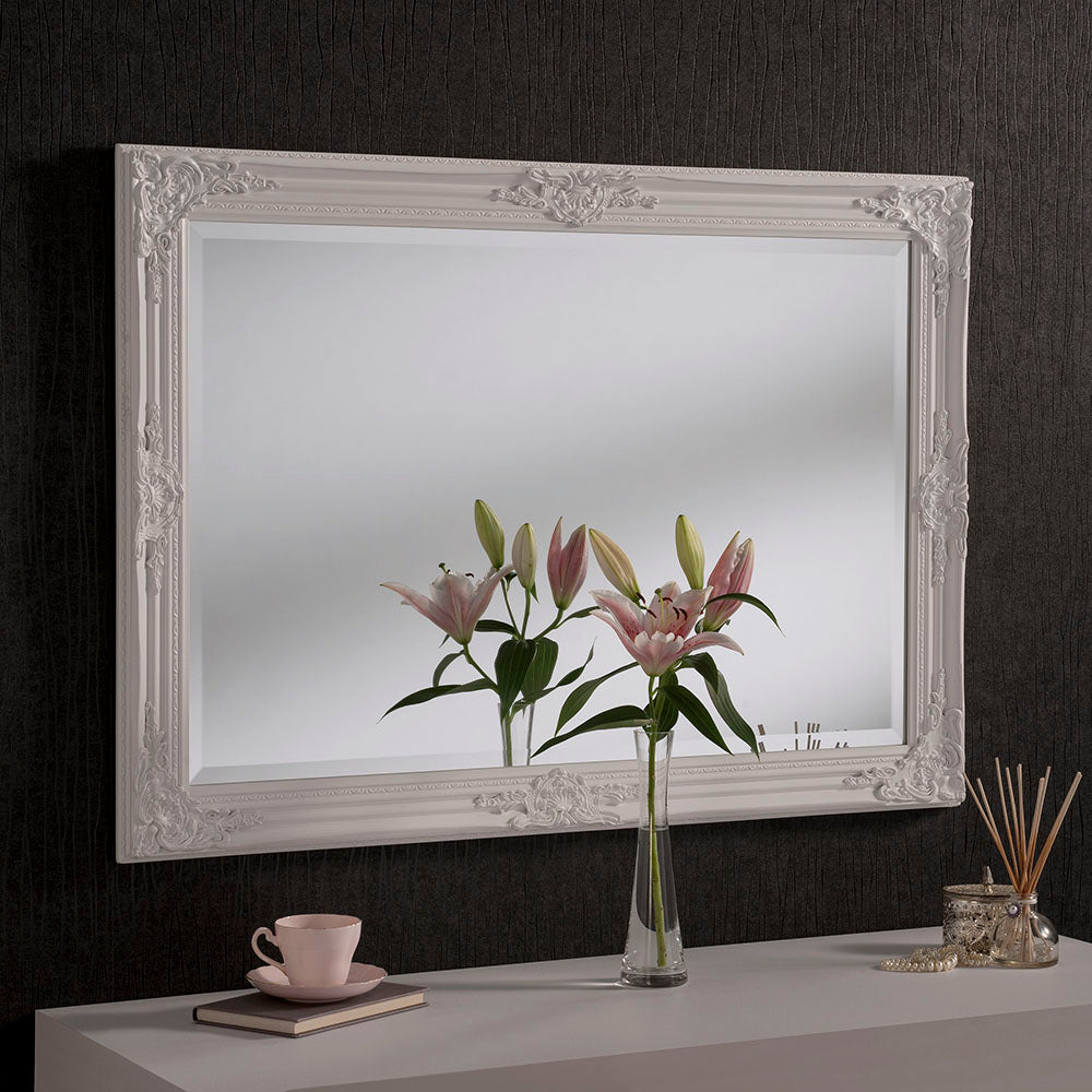 Carved white framed wall mirror