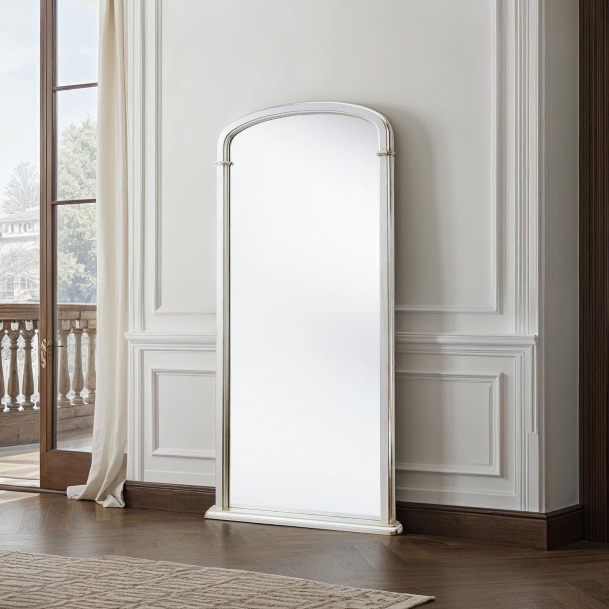 Tall curved silver arch mirror