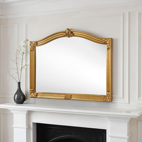 Arched carved overmantle gold