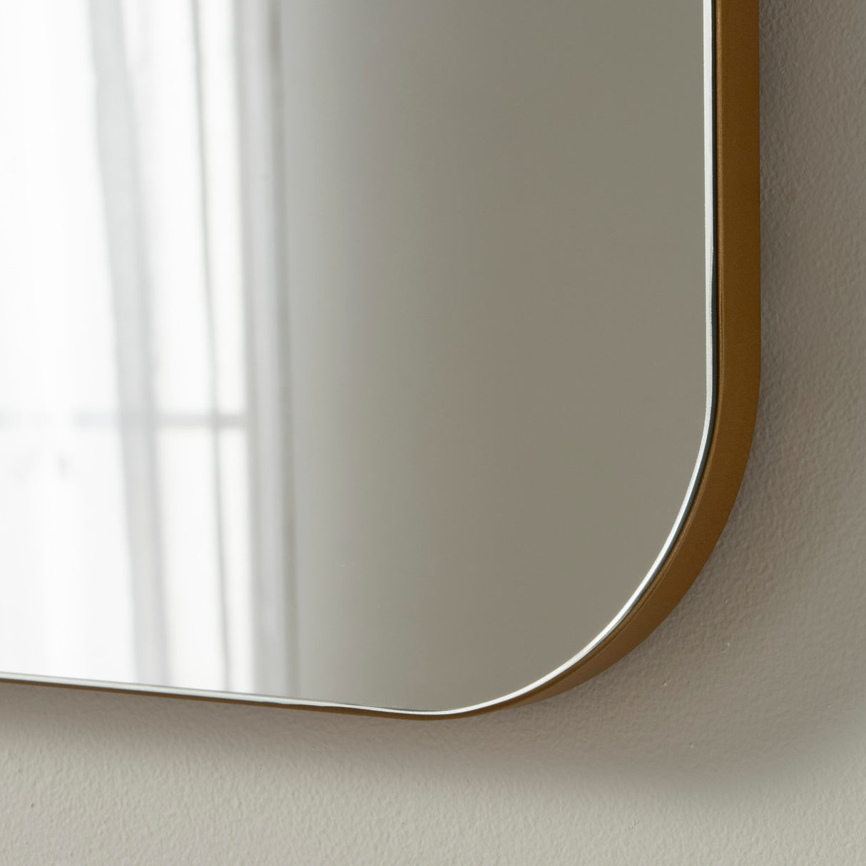 Gold minimal curved frame arched glass mirror