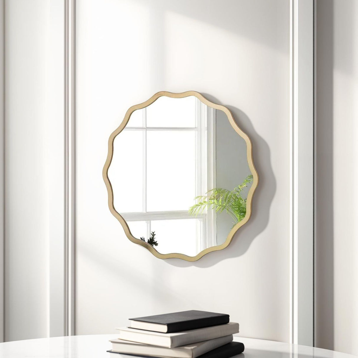 wavy round gold mirror