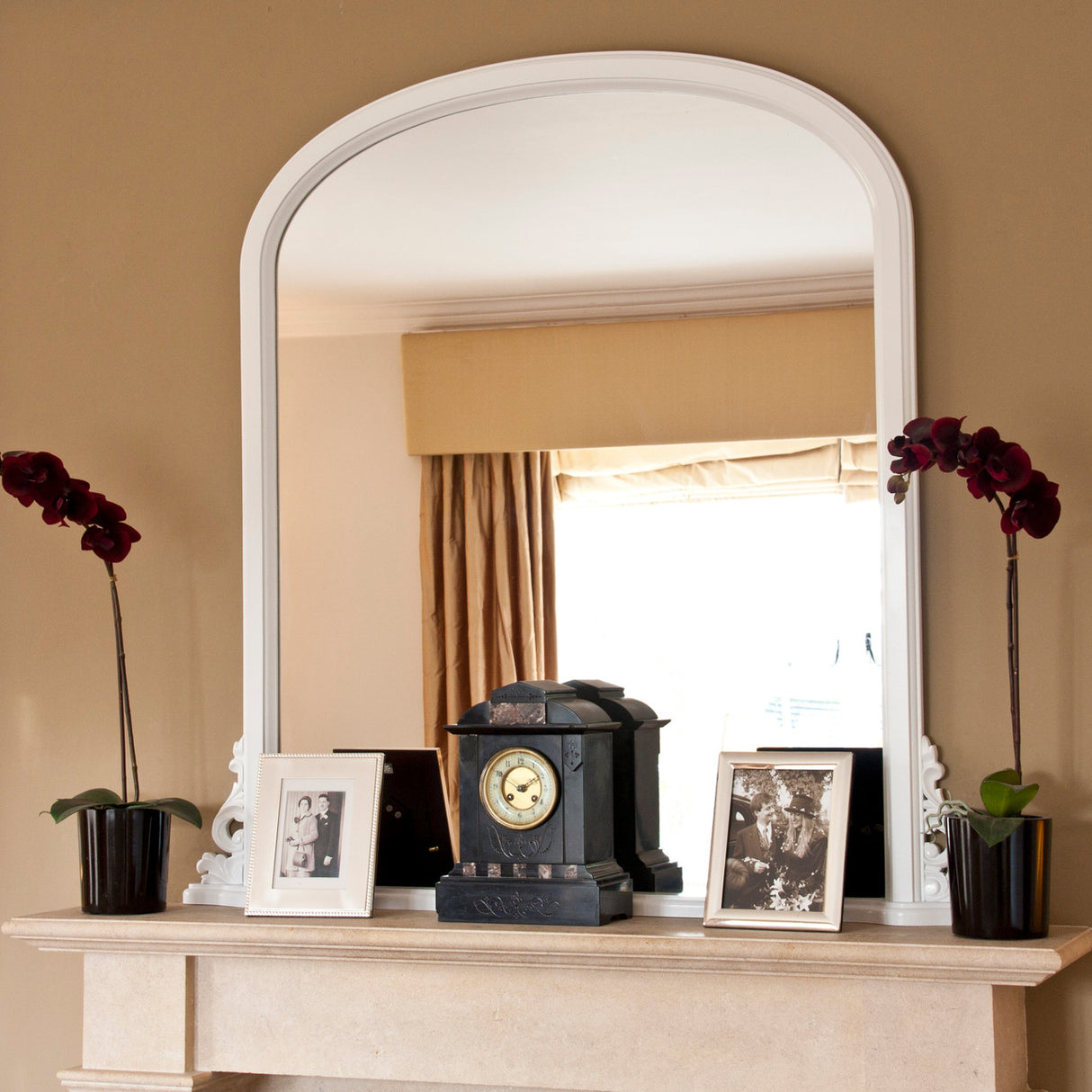 White frame arched beveled glass mirror