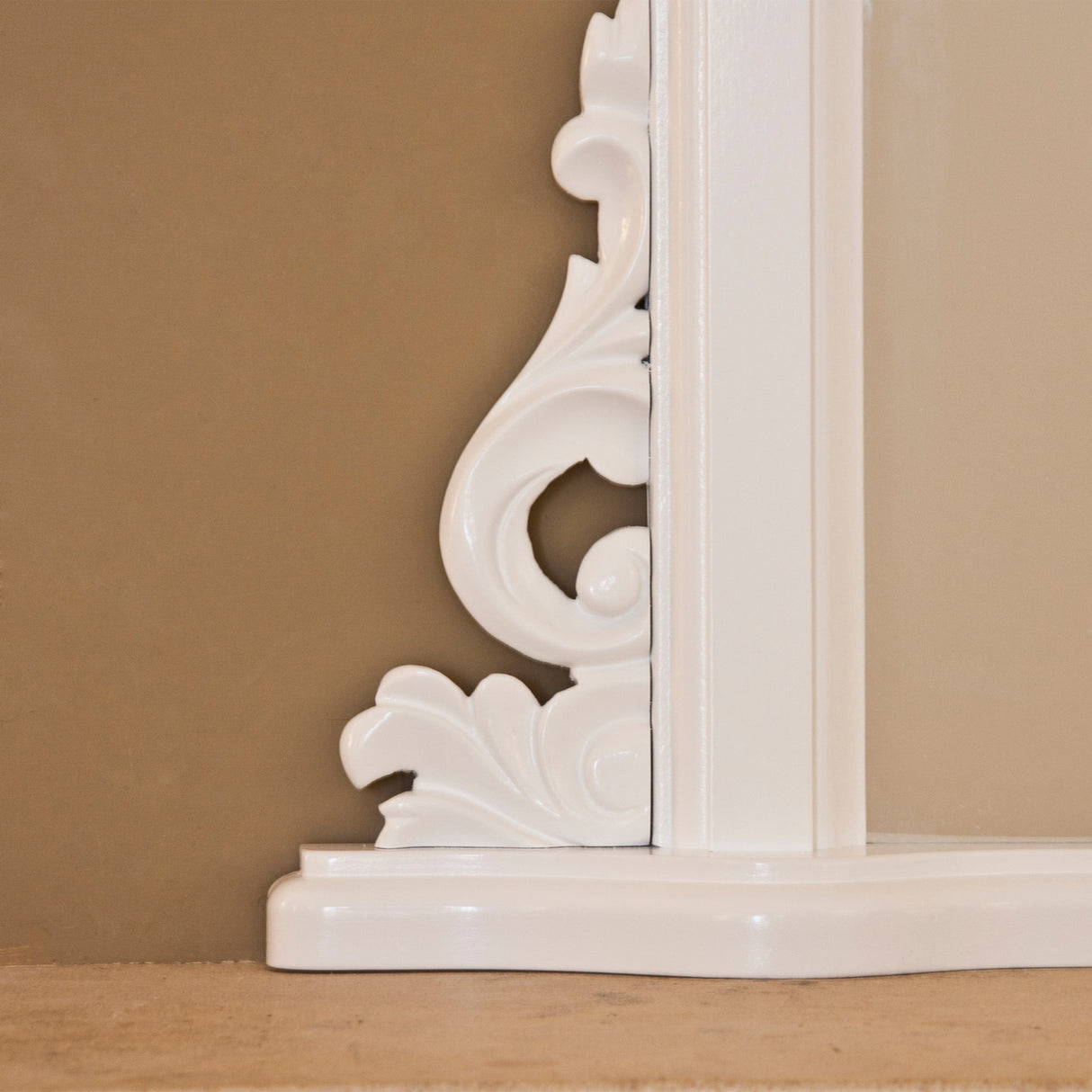 White frame arched beveled glass mirror