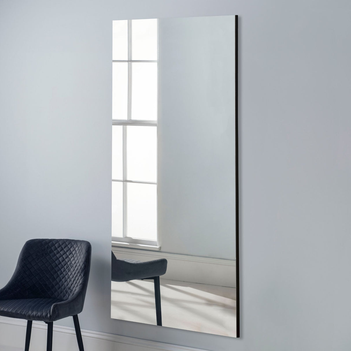 Large rectangular frameless full length glass wall mirror