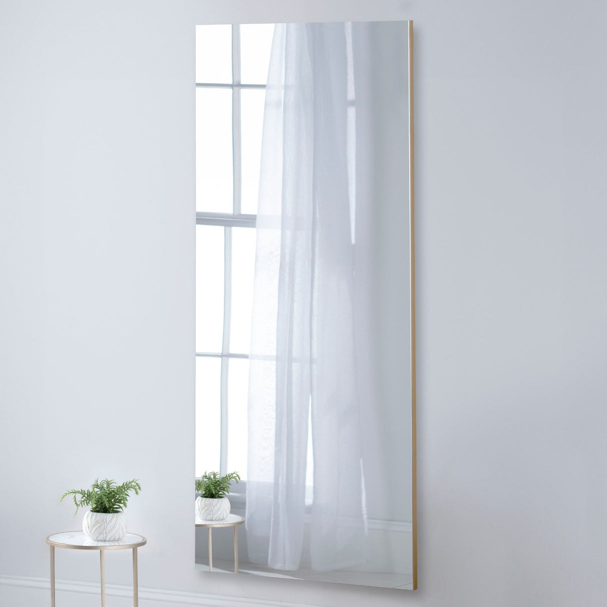 Large rectangular frameless full length glass wall mirror