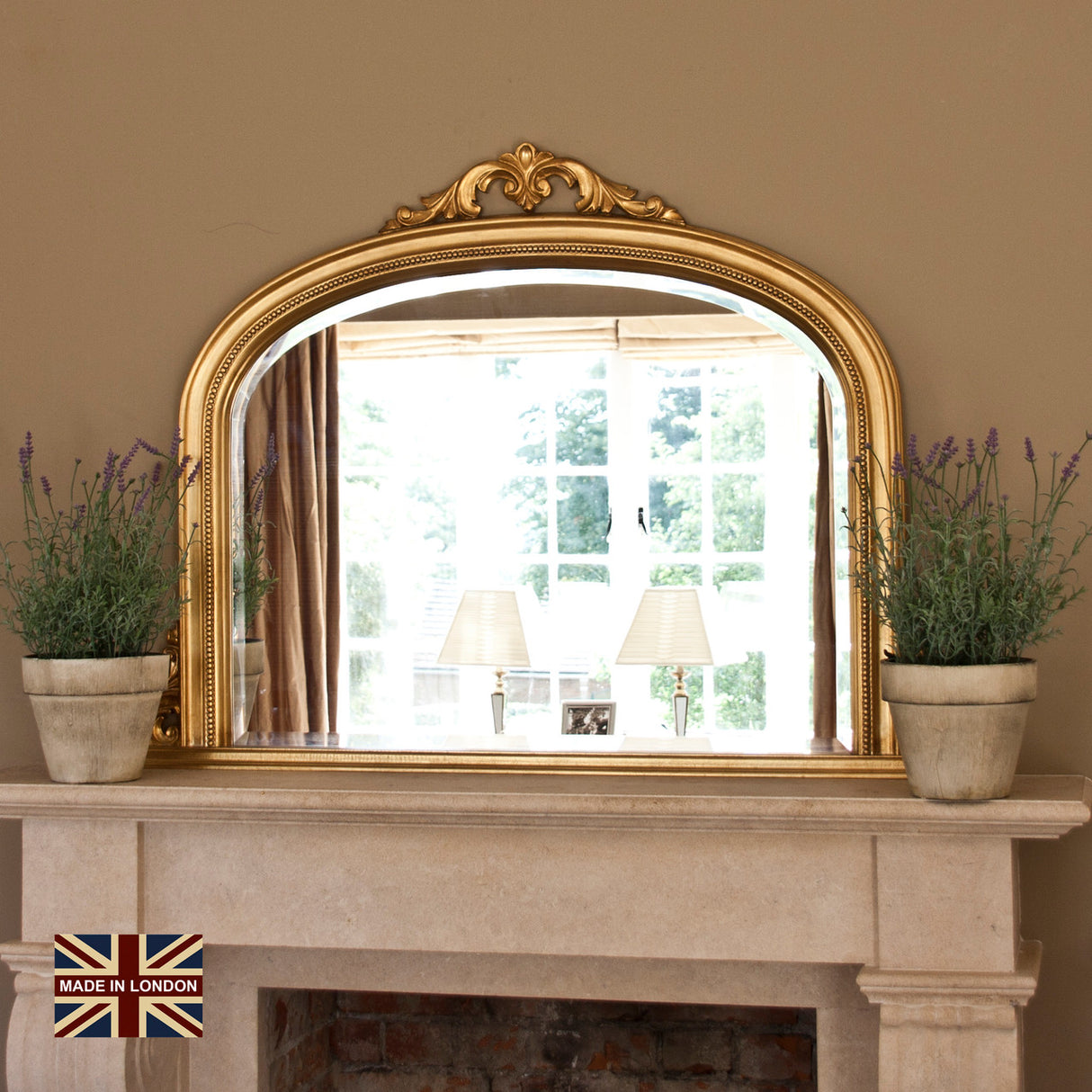 Antiqued gold decorative frame arched beveled glass mirror