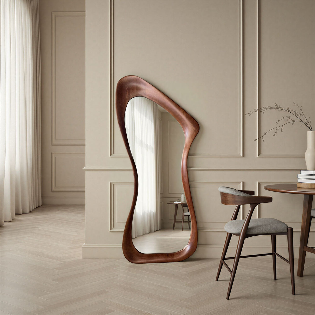 Wooden floor mirror in a stylish room with a chair and table.