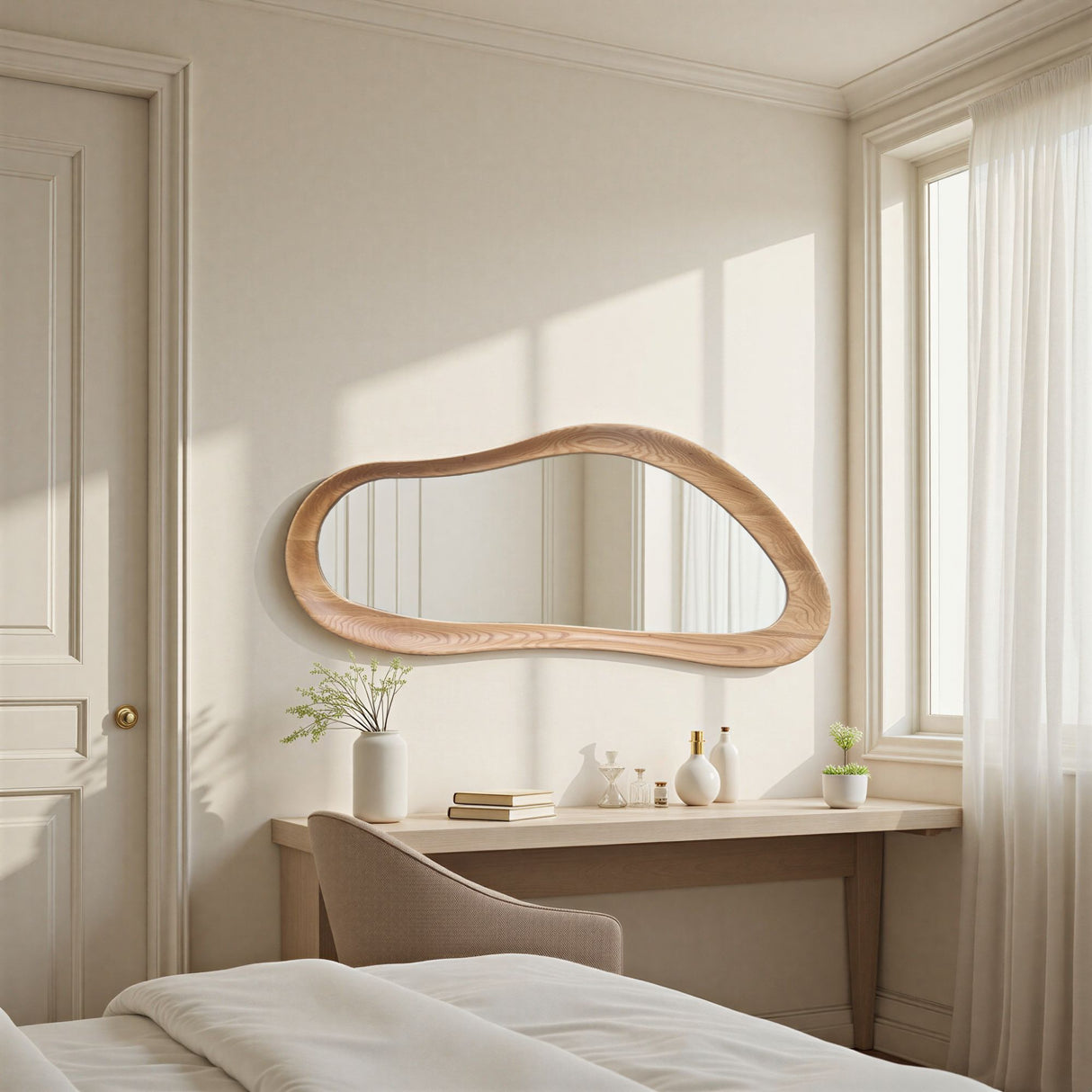 Wooden mirror on a wall above a desk with decor items in a bright room.