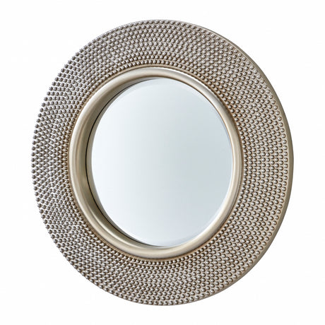 Round mirror with textured silver frame on a white background