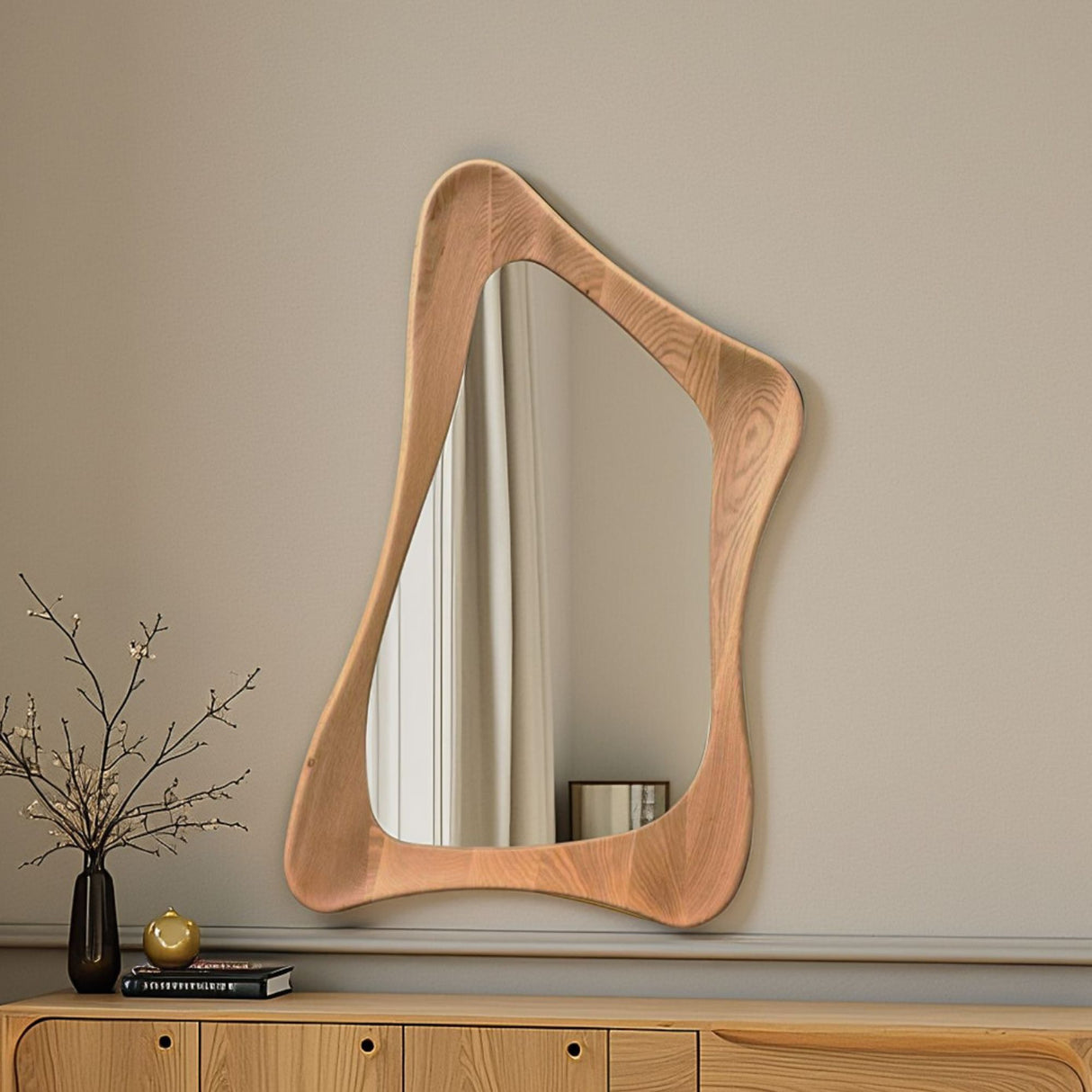 Wooden mirror with wavy frame on a beige wall