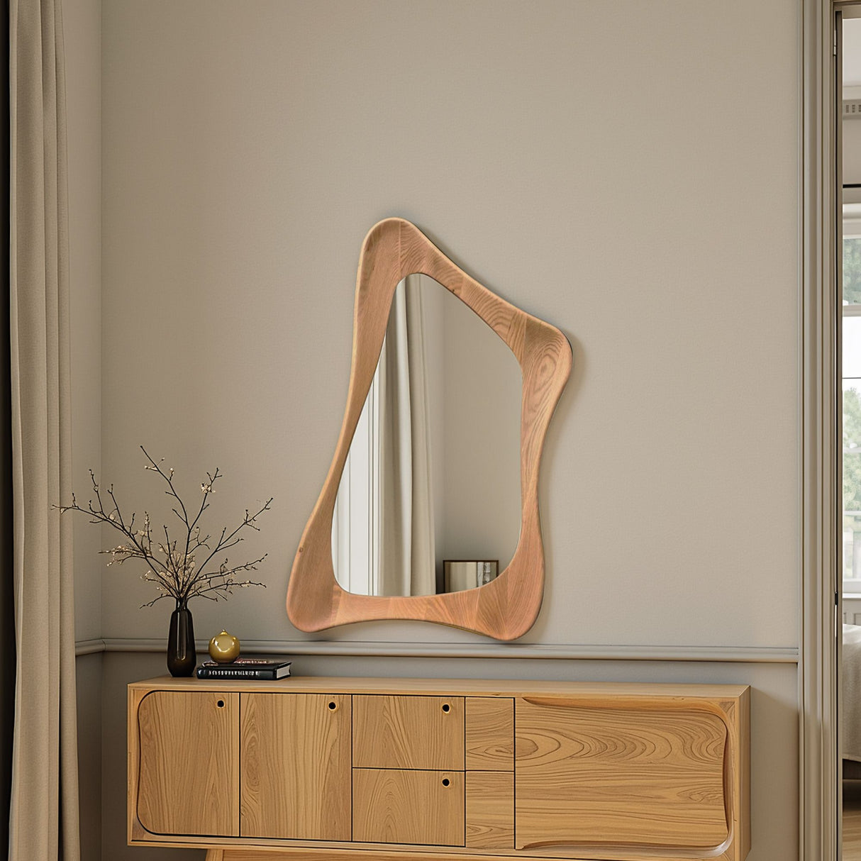 Wooden dresser with a unique mirror above it against a beige wall.
