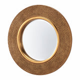 Round mirror with a textured gold frame on a white background